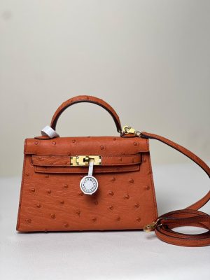 Hermès Kelly. Ostrich. Sellier Handbag in Terre cuitte with palladium hardware 11
