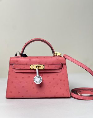Hermès Kelly. Ostrich. Sellier Handbag in Terre cuitte with palladium hardware 5