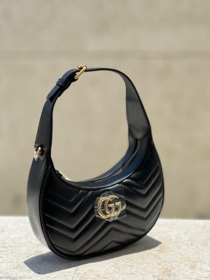 Gucci. GG. Mormont half-moon- shaped mini bag 2