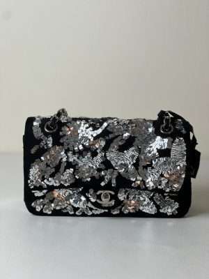 Chanel classic black and silver mini flap bag